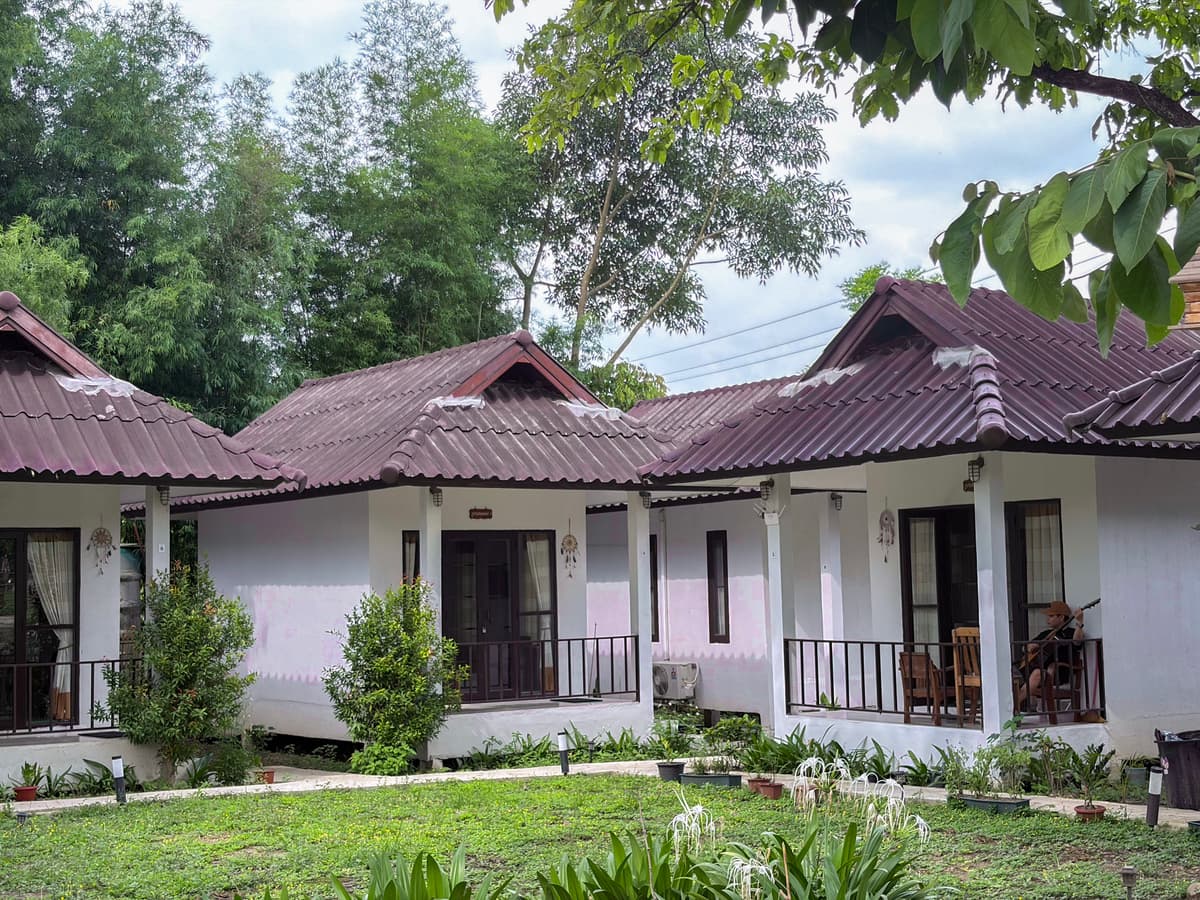A-Thip House guesthouse exterior surrounded by nature in Pai