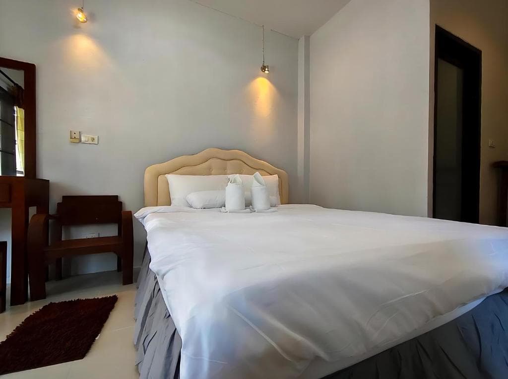 Air conditioned room with amenities at A-Thip House Pai